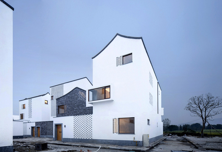 Dongziguan Affordable Housing for Relocalized Farmers / gad - Windows, Facade