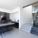 Villa E / MARC architects - Houses, Kitchen, Door, Stairs, Handrail, Facade, Countertop, Table, Lighting, Chair