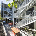 MacArthur Annex / Baran Studio Architecture - Shopping Centers, Garden, Facade, Handrail, Balcony, Stairs, Chair