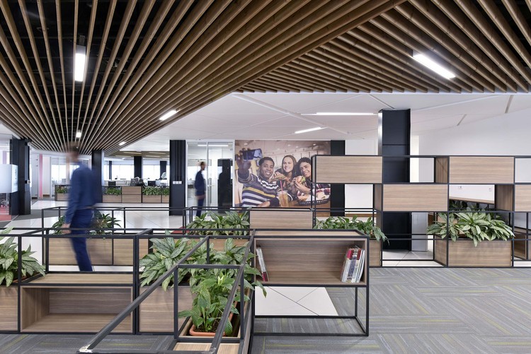 Golnan Puratos Complex / A1Architecture - Offices Interiors, Facade, Beam, Lighting, Bench, Table