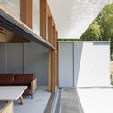 Off Grid House in Yokohama / abanba - Houses, Courtyard, Facade, Door, Handrail, Table, Bench