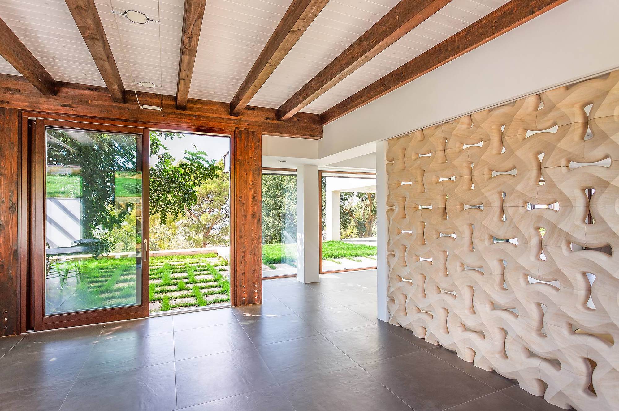 Galería de Casa con patio de piedra / Studio 4e - 4