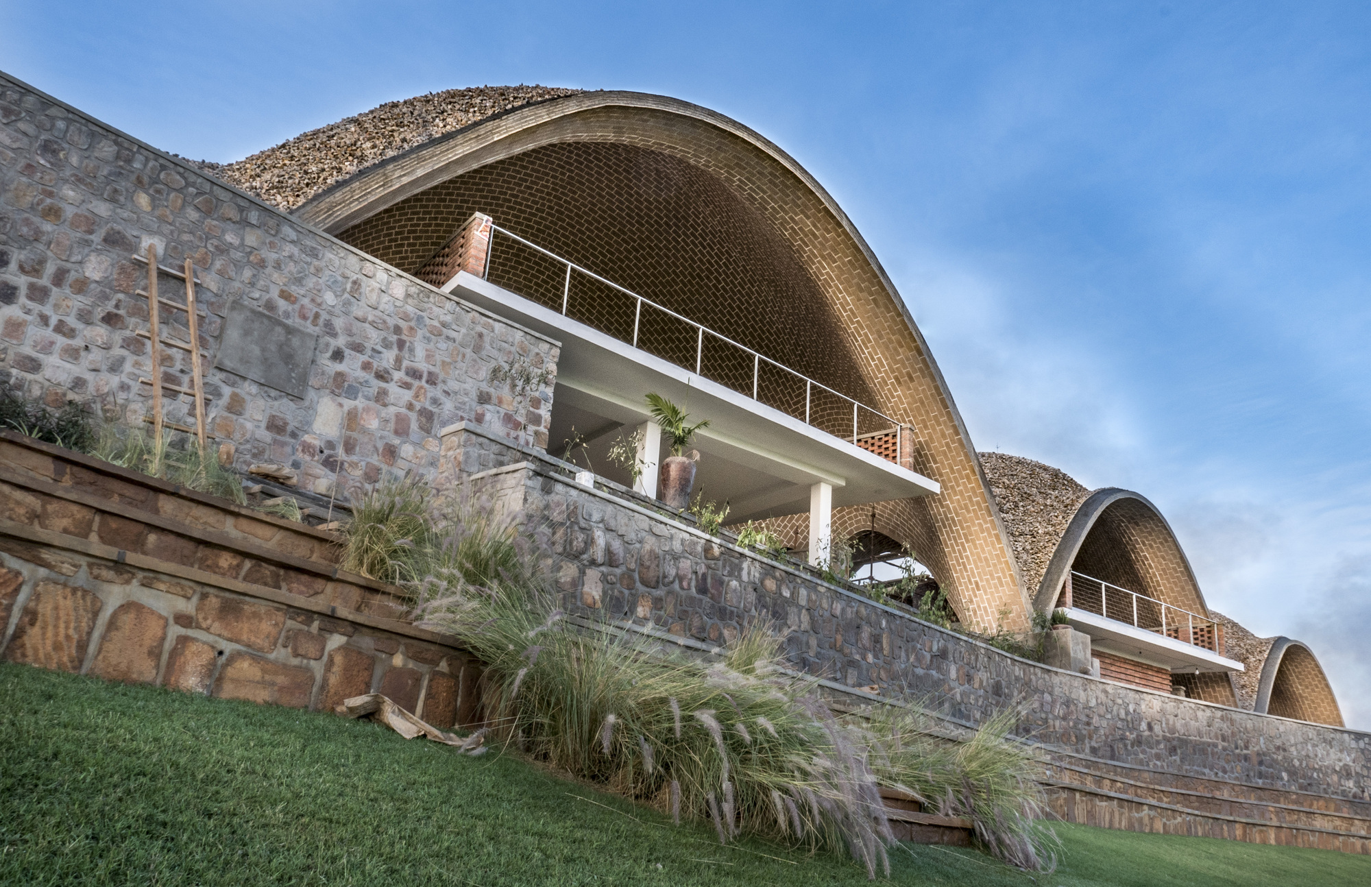 Gallery of Rwanda Cricket Stadium / Light Earth Designs 8