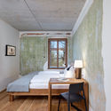 Conversion of a Former Brewery to a Hotel / KÜHNLEIN Architektur - Table, Bed, Bedroom, Beam, Windows