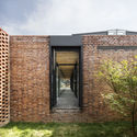 Brown Sugar Factory / DnA - Community Center, Garden, Facade, Door, Arch