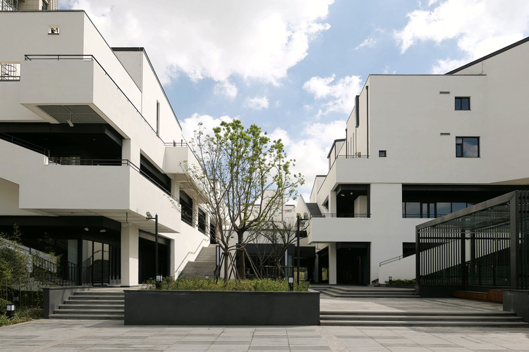 Shanghai Nanxiang Neighborhood Center  / XYP Design+Technology - Windows, Facade, Stairs