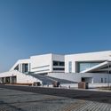 Olympic Sports Center Of Pingdu Qingdao / Shanghai Jiao Tong University Urban Planning & Architectural Design Co.Ltd - Stadiums
