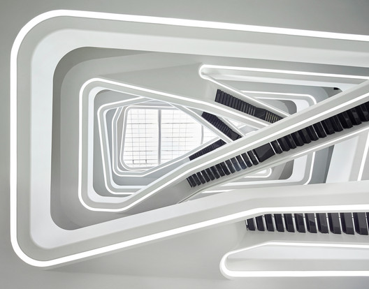 © Hufton + Crow. ImageStaircases such as this one, in ZHA's Dominion Office Building, are beautiful design elements but can pose challenges to those with limited mobility. 