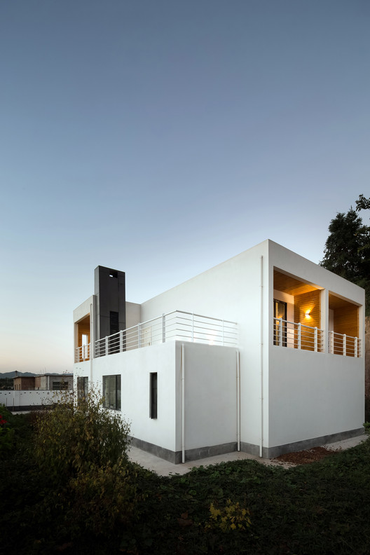 Village Residence / Ming Ding Spatial Art Studio - Image 3 of 32