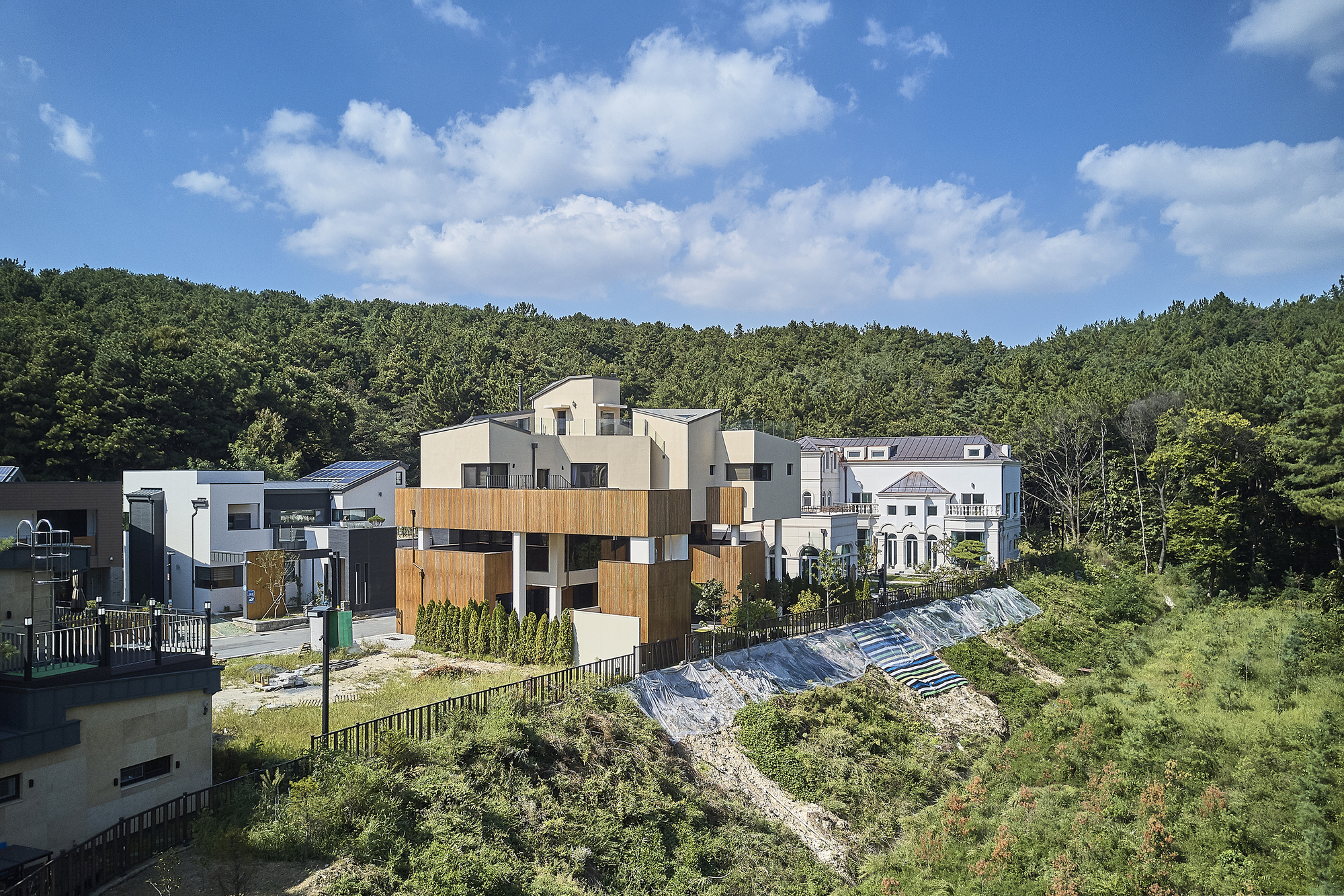 Gallery of Urban Hamlet / Chiasmus Partners 13