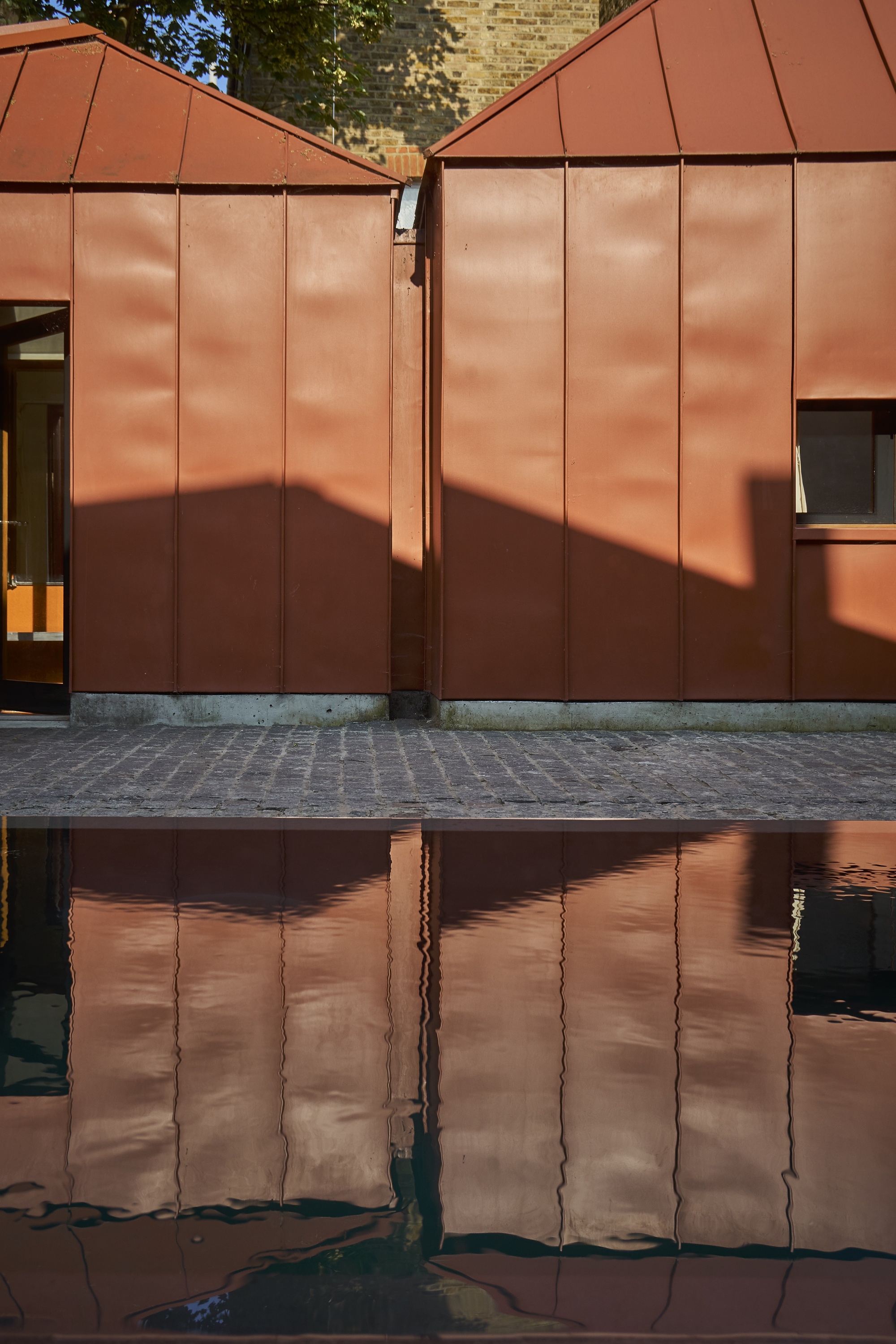 Galería de Tin House / Henning Stummel Architects 8