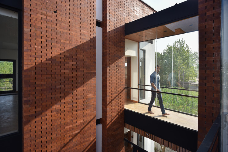 Maziar Brick House / Naghshe Khak Architectural Group - Brick, Facade, Handrail