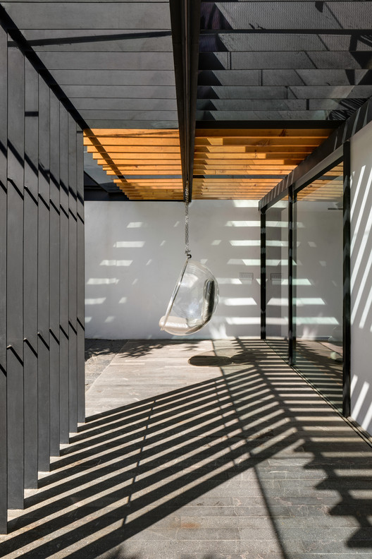Cachai House / taller paralelo - Image 5 of 24