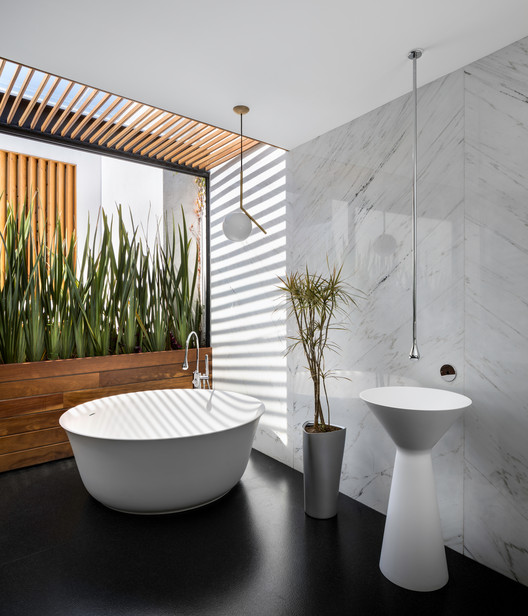 Cachai House / taller paralelo - Image 8 of 24