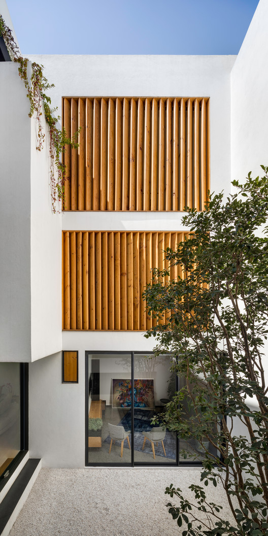 Cachai House / taller paralelo - Image 6 of 24