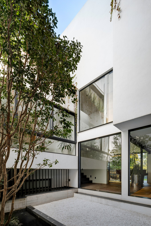 Cachai House / taller paralelo - Image 13 of 24