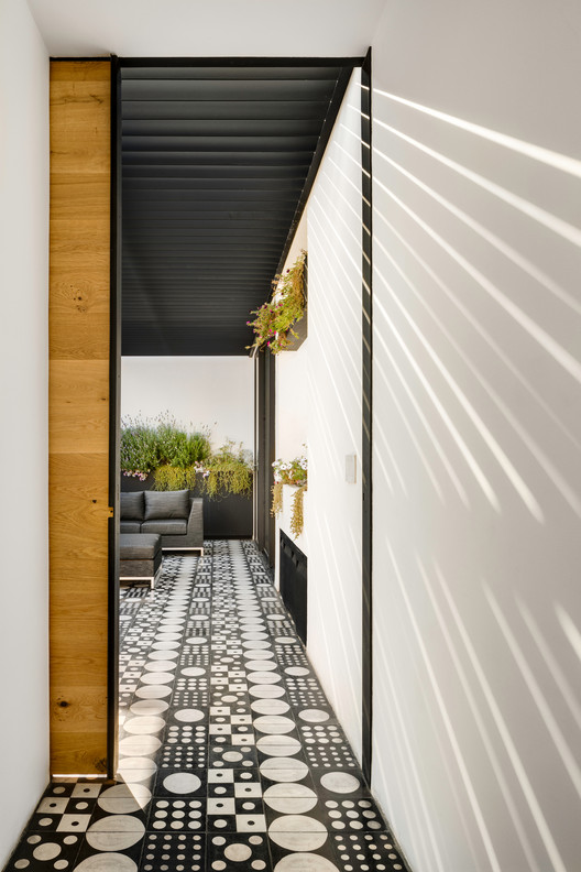 Cachai House / taller paralelo - Image 7 of 24