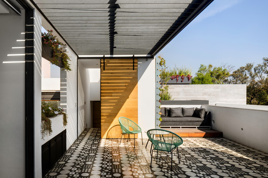 Cachai House / taller paralelo - Image 12 of 24
