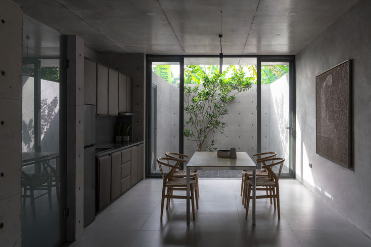 Duyen Ha House / Nguyen Thanh Trung Architects - Table, Windows, Chair, Countertop