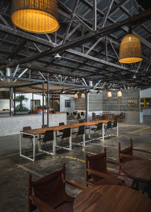 Factory Phnom Penh Social Hub / Bloom Architecture - Exterior Photography, Table, Chair, Beam