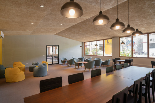 Factory Phnom Penh Social Hub / Bloom Architecture - Interior Photography, Dining room, Table, Windows, Chair
