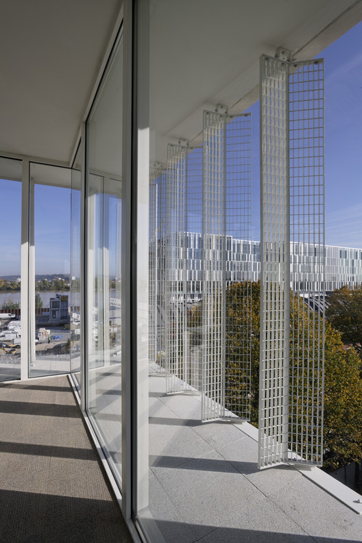 Opus 33 Office Building / Patrick Arotcharen - Facade, Column, Windows, Handrail