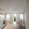 Building in Alfama / SCC Arquitectos - Interior Photography, Kitchen, Table, Windows, Chair, Countertop
