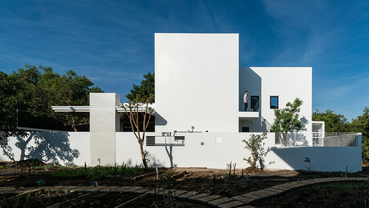 Casa Mom Apron / Story Architecture - Fotografía exterior, Concreto