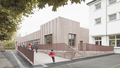 豪瑞斯娱乐中心，灰粉色‘水浪’立面 / graal