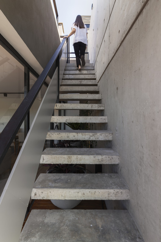 AER La Pampa Building / Cubero Rubio - Interior Photography, Stairs, Concrete, Handrail