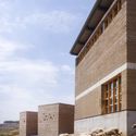 Macha Village Center / OnEarthStudio - Exterior Photography, Concrete, Brick