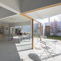 House and Office in Hofu / Tato Architects - Interior Photography, Kitchen, Shelving