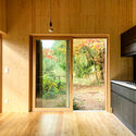 Holiday House at the Pond / Foeldvary Staehelin - Interior Photography, Kitchen, Countertop, Windows