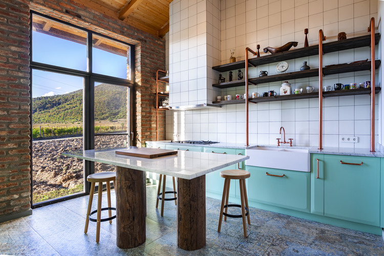 House in Artana / NS Studio - Interior Photography, Kitchen, Table, Windows, Countertop, Chair, Beam