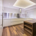 Apartment in São Vitor / AZO. Sequeira Arquitectos Associados - Interior Photography, Apartment Interiors, Kitchen, Countertop