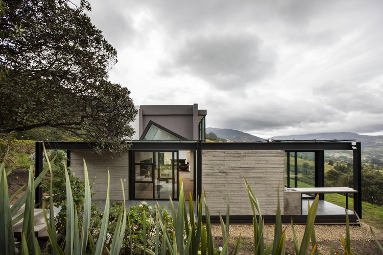 Ampliación Casa Ojito de Agua / Lacaja Arquitectos - Fotografía exterior, Ampliación, Jardín, Fachada