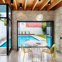 South Side Courtyard House Pool Pavilion & Landscape / studio d'ARC - Interior Photography, Pavilion, Door, Table, Chair, Lighting