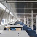 Librio Yukuhashi Library / MIKAMI Architects - Interior Photography, Stairs, Shelving, Table, Chair