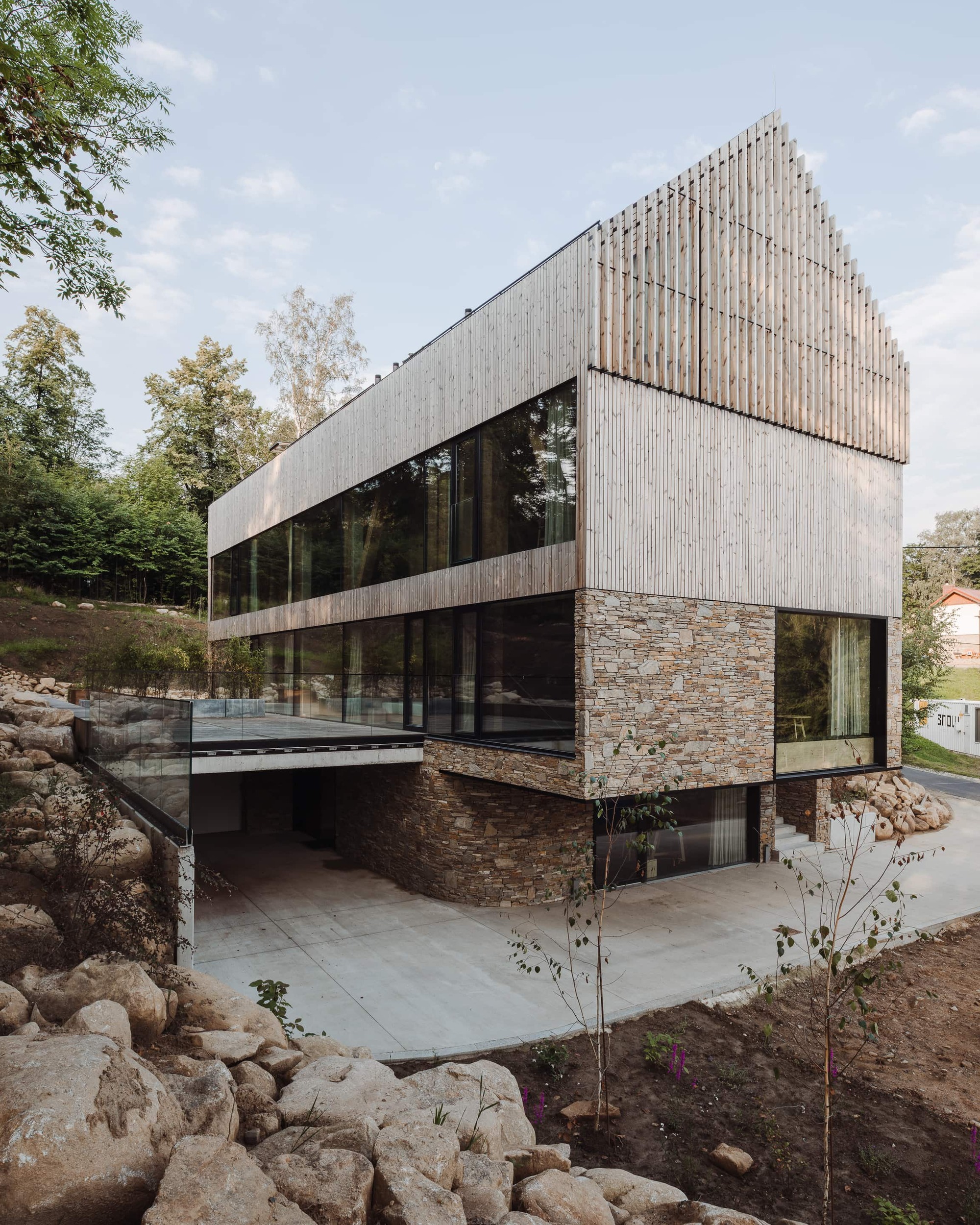 Gallery of Apartments in Wolf Clearing / studio de.materia 6