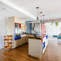 Ampliación de un apartamento en el Edificio Brasil / Alvorada Arquitetos - Fotografía interior, Cocina, Madera