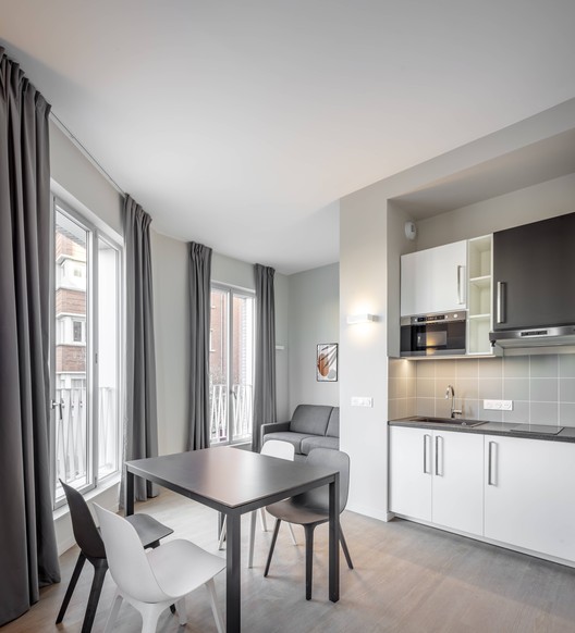 Apartment Building in Paris / CoBe Architecture & Paysage - Interior Photography, Kitchen, Table, Windows, Chair, Door, Countertop