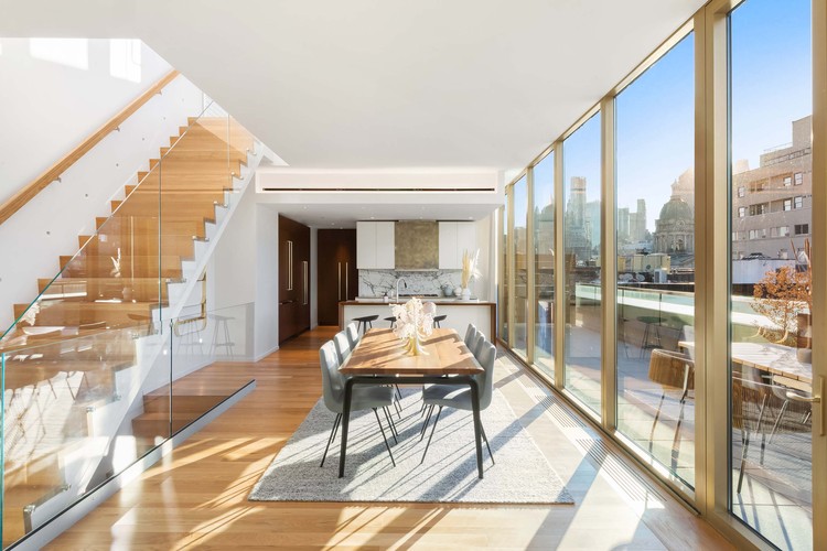 75 Kenmare Residential Building / Andre Kikoski - Interior Photography, Table, Sofa, Windows, Glass, Handrail