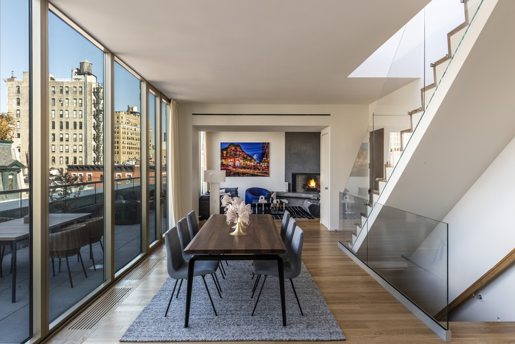 75 Kenmare Residential Building / Andre Kikoski - Interior Photography, Dining room, Table, Chair, Windows, Beam