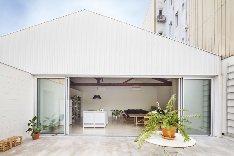 Warehouse Transformation / Thomas Raynaud + Paul Devarrieux - Exterior Photography, Mixed Use Architecture, Courtyard, Facade, Door, Table, Chair