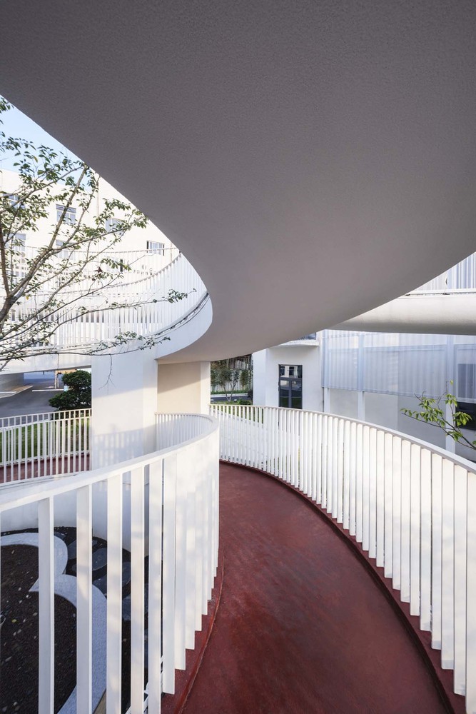 Gallery of Jiangnan District Embroidered Garment Factory / Minax