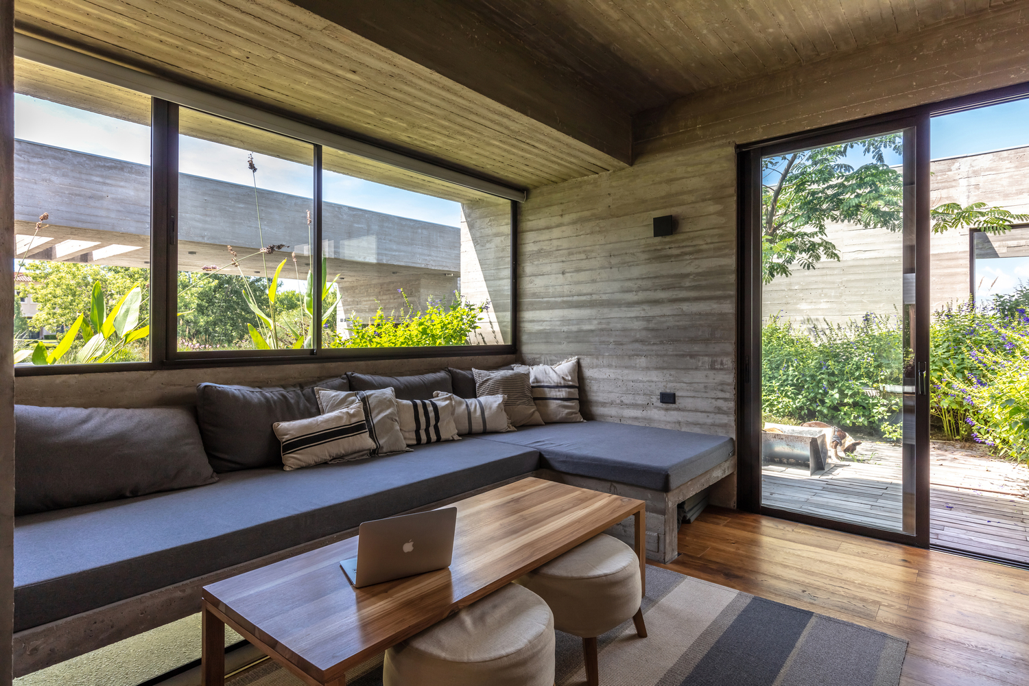 Gallery of 10 Houses with Sofas Built in to the Architecture 3