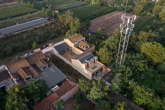 Red Brick Dwellings in Ezi Village / XAUAT - Exterior Photography