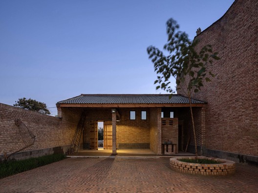 Red Brick Dwellings in Ezi Village / XAUAT - Exterior Photography, Door