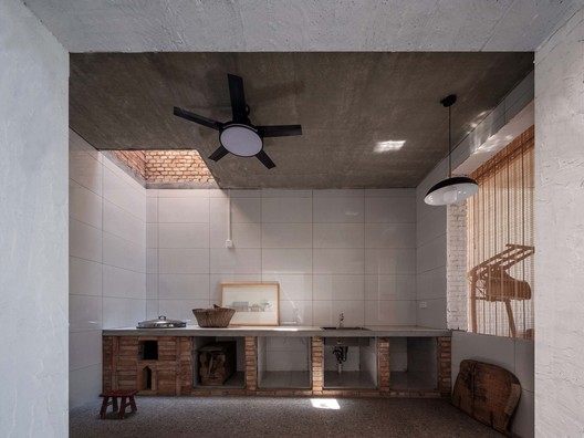 Red Brick Dwellings in Ezi Village / XAUAT - Interior Photography, Kitchen, Countertop, Beam