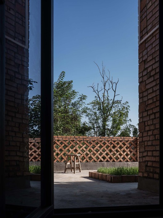 Red Brick Dwellings in Ezi Village / XAUAT - Exterior Photography, Brick
